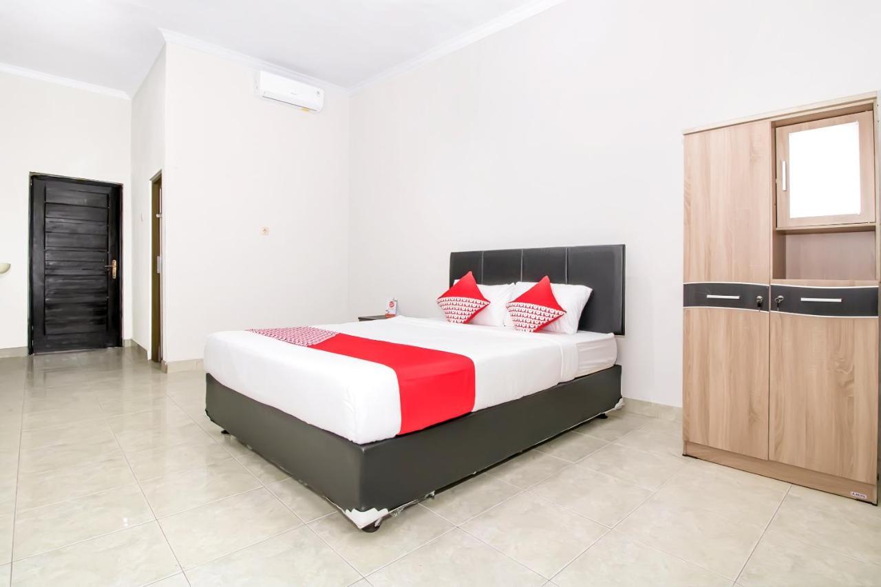 Отель Oyo 2984 Berlian House Ungasan Джимбаран Экстерьер фото